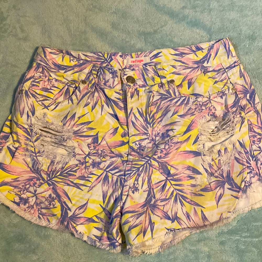 Distressed floral denim shorts